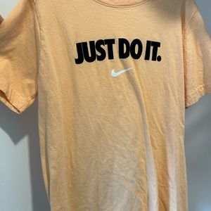orange nike shirt